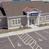 Baycoasrt bank building parking area arial view